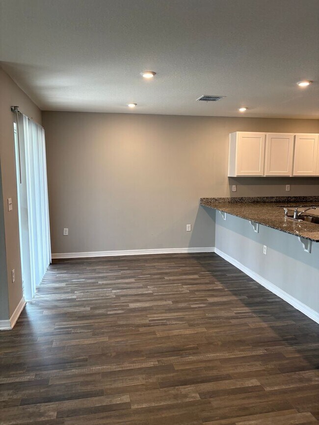 Building Photo - Beautiful 4-Bedroom Corner-Lot Home in Poinciana with 2-Car Garage