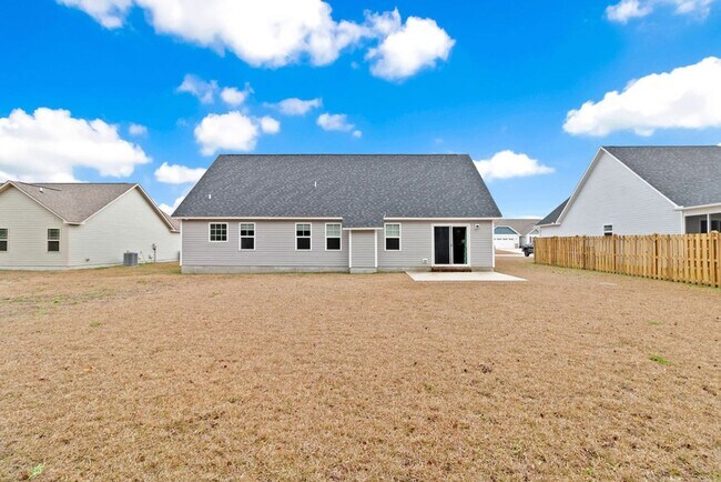 Building Photo - Minutes to Back Gate & Beaches!