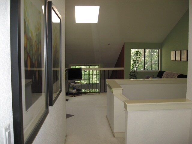 Upstairs hallway leading to loft area - 186 Pelican Ln