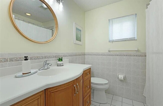 Building Photo - 7316 Caladesia Dr