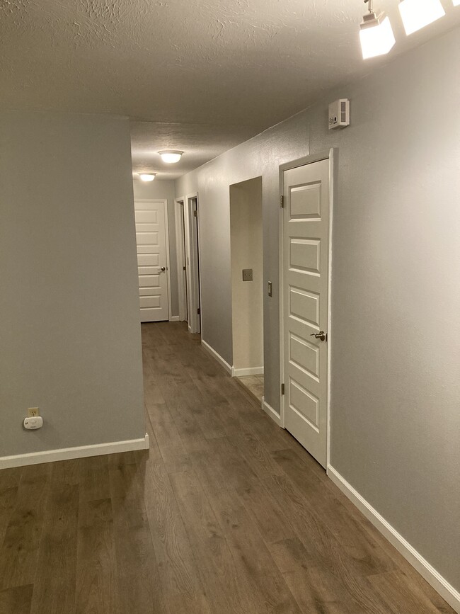 Looking down bedroom hallway from LR - 1307 E 30th Ave