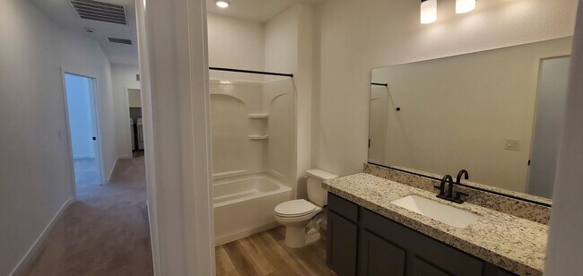 Building Photo - Beautifully designed modern townhome with attached garage.