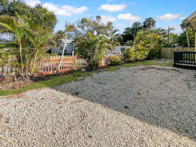 Building Photo - Deck the halls or the French doors, becaus...