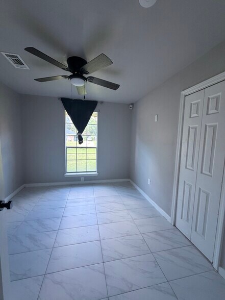 Bedroom 1 - 7118 Melpomene Dr