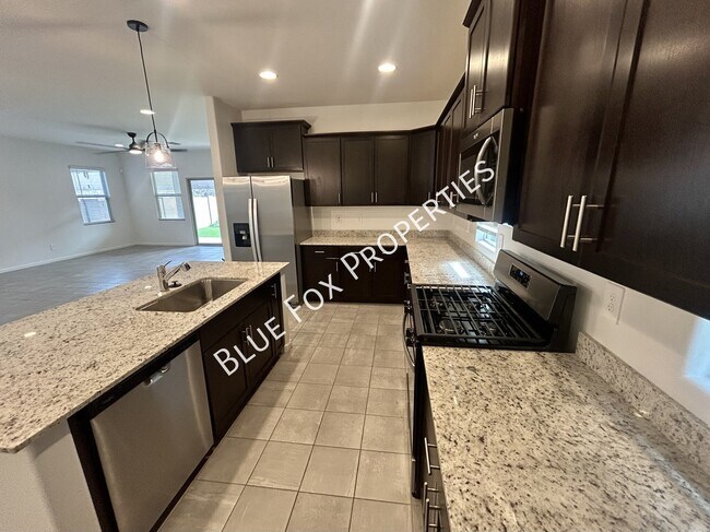 Building Photo - 6973 W Jadewood Ln