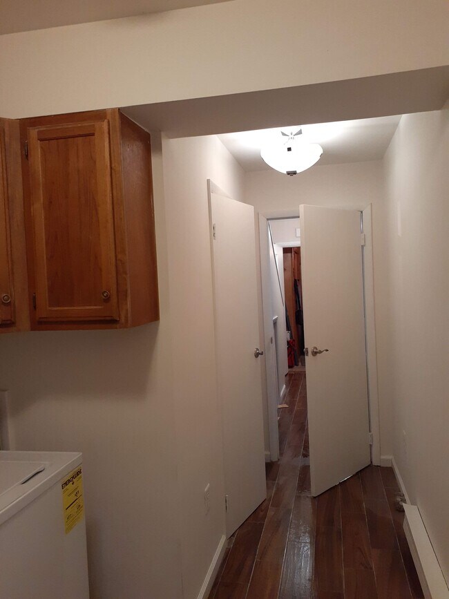 Downstairs' hallway from laundry room - 20 Elizabeth Way