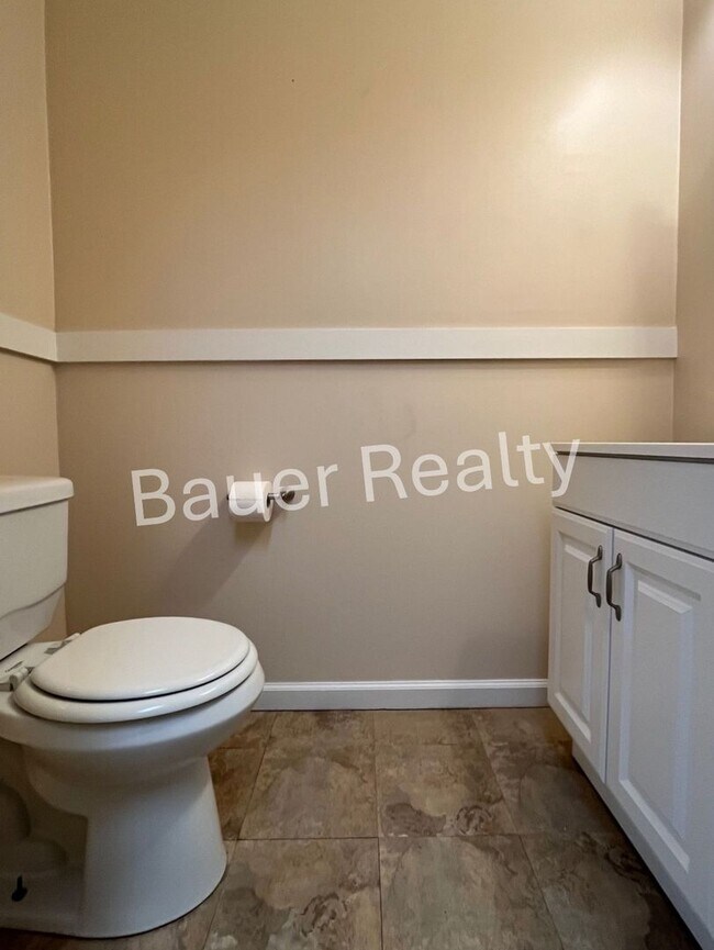 Building Photo - Three bedrooms, one and a half baths