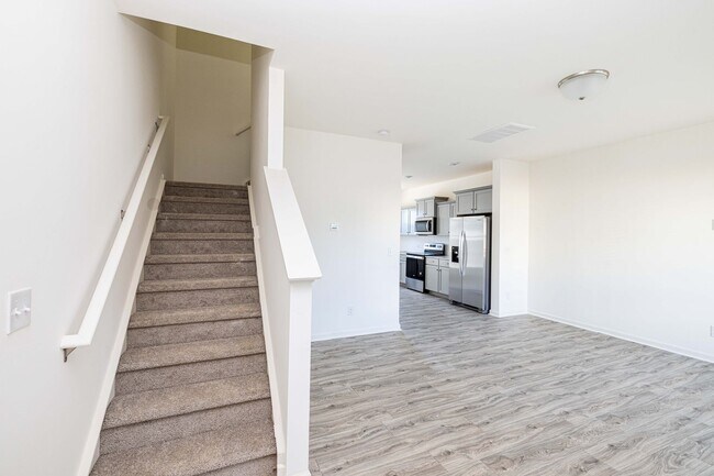 Building Photo - READY IN AUGUST 3 br 2.5 Townhome Near His...