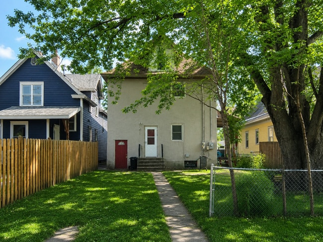 Building Photo - Spacious 2BR + Sunroom Main Floor in NE Arts District – Steps to Logan Park & Breweries