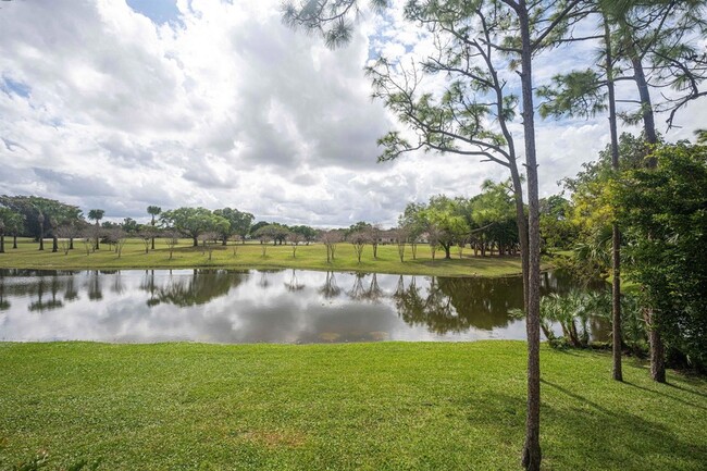 Building Photo - 1405 Palm Beach Trace Dr