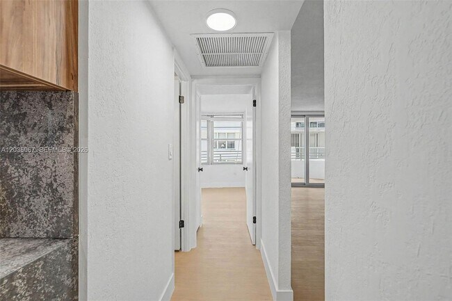 Building Photo - 5555 Collins Ave