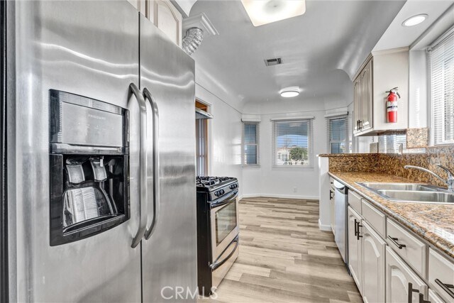 Building Photo - 9807 S Denker Ave