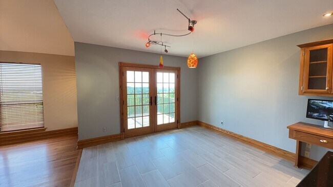 Building Photo - Welcome home to breathtaking views in this...