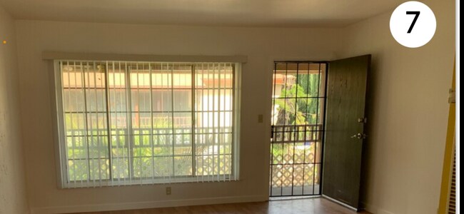 Front door and window - 14720 Strathern St
