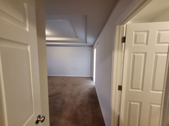 Building Photo - Spacious 4-Bedroom, 2.5-Bath Home Near Dow...