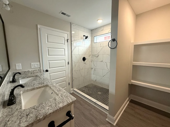 Building Photo - New construction home. 3 bedrooms plus a s...