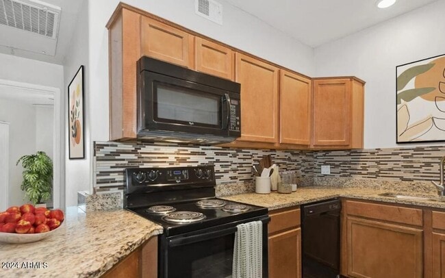 Building Photo - 9259 E Raintree Dr