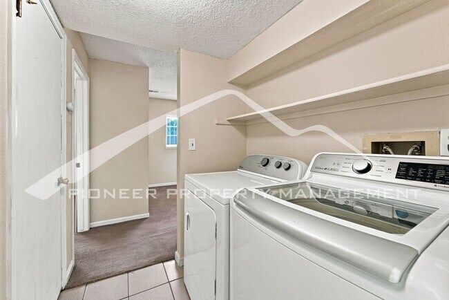Building Photo - Spacious Home with Central AC and 2-Car Garage
