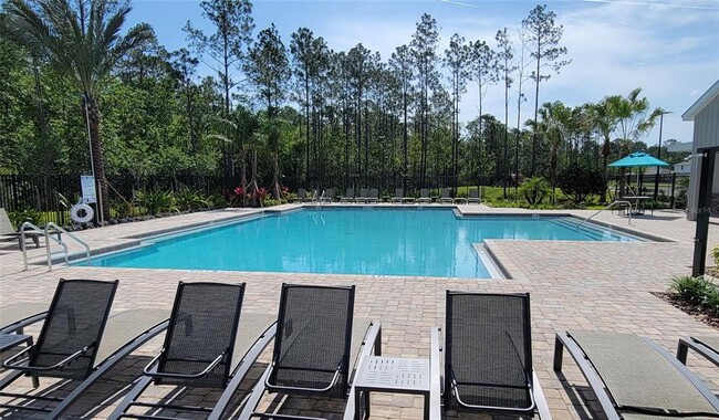 Building Photo - 5130 Magnolia Palm Dr