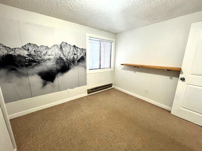 Building Photo - Creekside Condominiums #20C