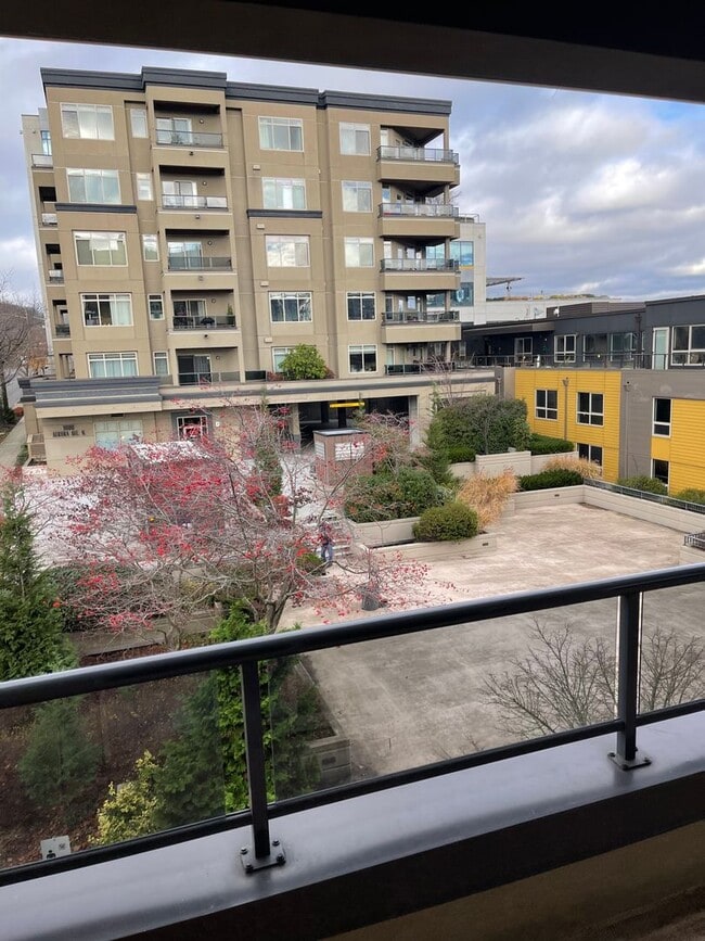 Building Photo - Updated Condo with Parking for One, Great Location and Communal Roof-top Deck!!