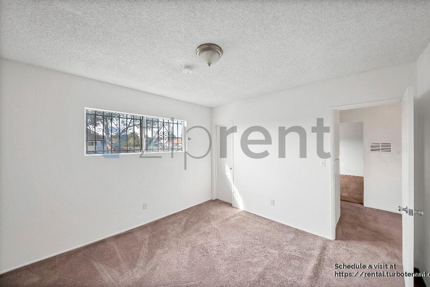 Building Photo - 2458 Normandie Ave