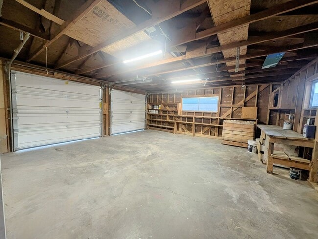 Building Photo - 4-bedroom house with a 2-car garage availa...