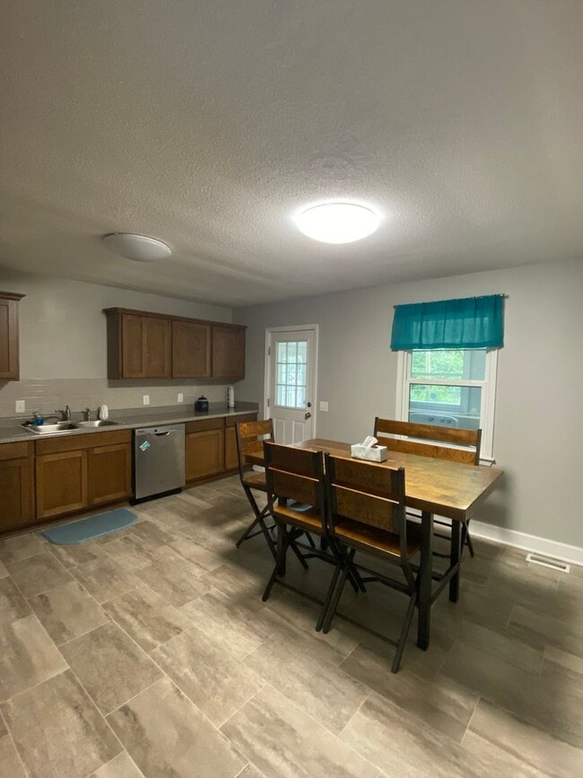 Building Photo - Spacious 3BR/2BA with Open Layout and Large Backyard