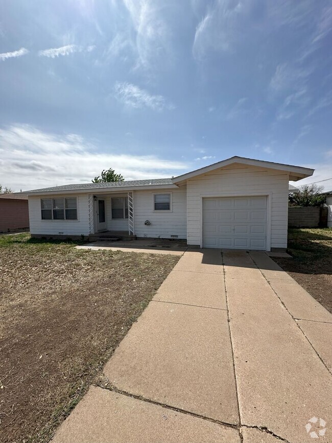 Building Photo - For Rent: 3 Bed, 1.5 Bath Home with Garag...