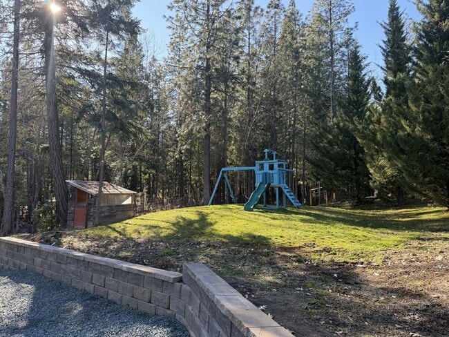 Building Photo - 7429 W Evans Creek Rd