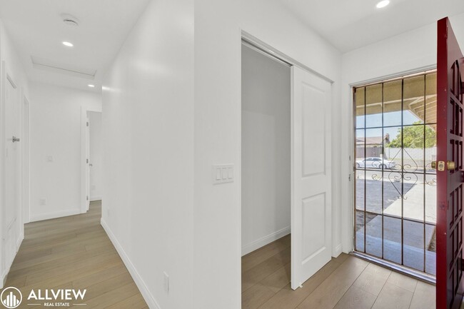 Building Photo - Fully Renovated 4-Bedroom Home with Firepl...