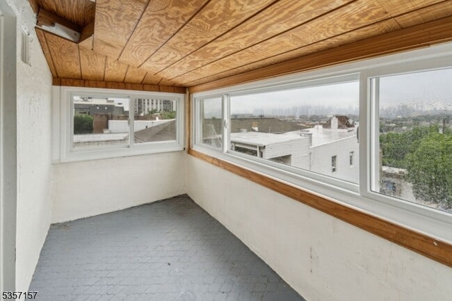 Building Photo - 310 Paterson Plank Rd