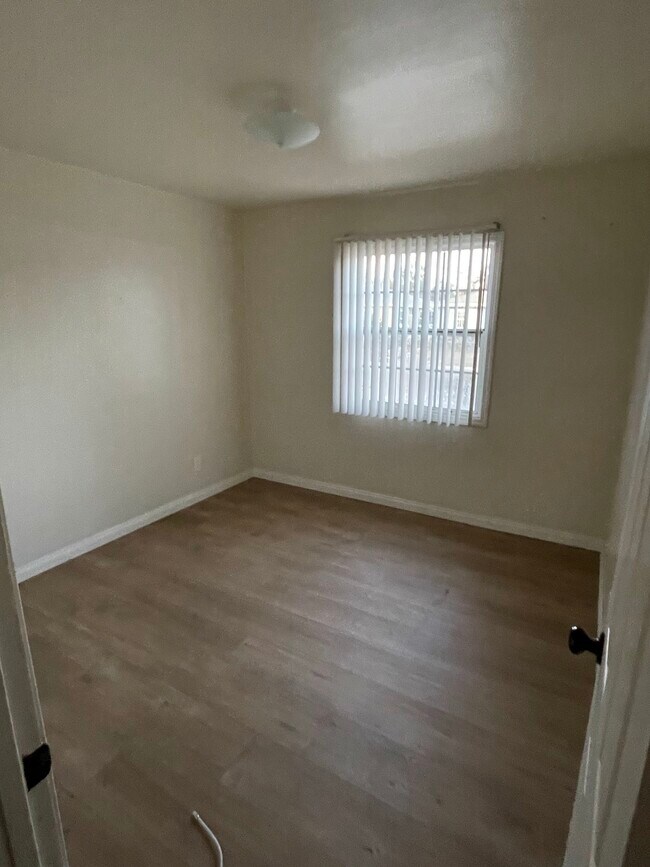New Laminate Flooring - 18609 Mettler Ave