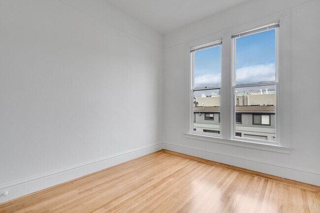 Building Photo - Remodeled pet friendly, top floor 2BR with in-unit laundry