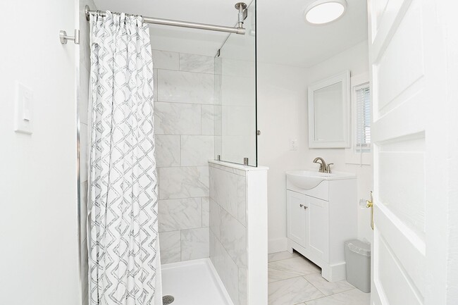 Building Photo - Furnished, Light-Filled Apartment With Utilities Included