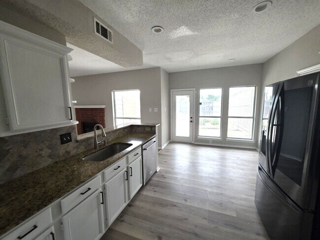 Building Photo - Spacious 4-Bedroom Home with Pool & Spa in...