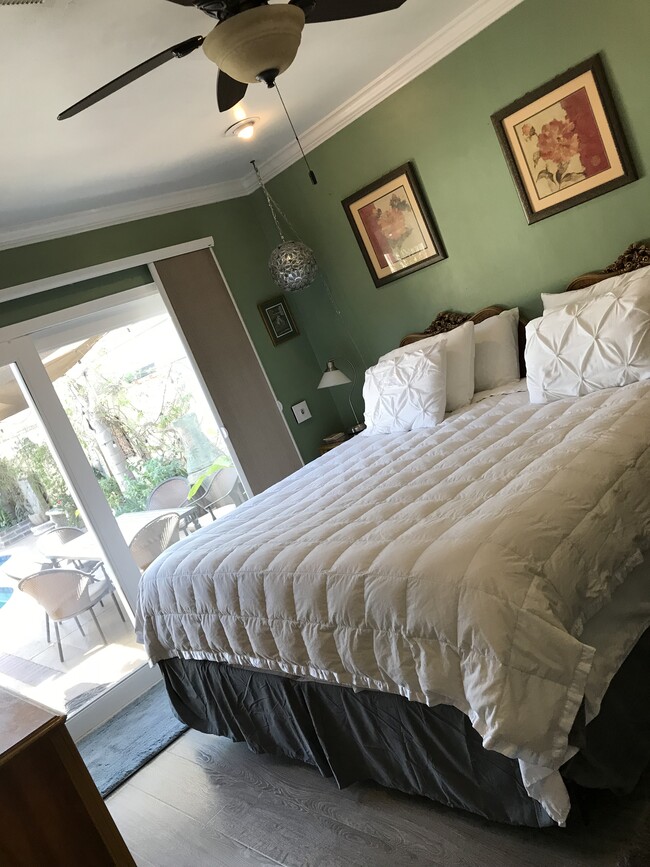 View from master bedroom with California King Size Bed. - 3822 Berryman Ave