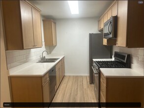Building Photo - 5705-5707 S. Vancouver Ave