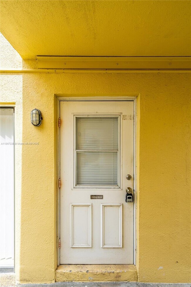 Building Photo - 11398 Royal Palm Blvd