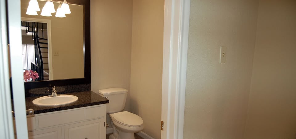Half bath by kitchen - 8710 Park Ln