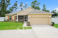 Building Photo - Feel welcome and comfortable in this charming home