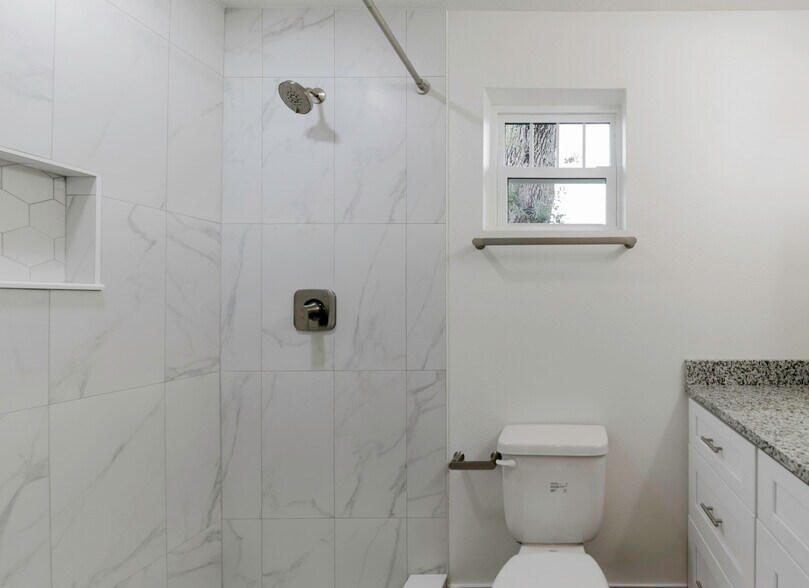 bathroom with tiled shower - 2735 4th Ave S