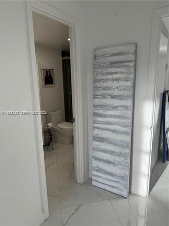 Building Photo - 19370 Collins Ave