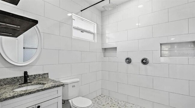 Building Photo - 1411 E 24th Ave