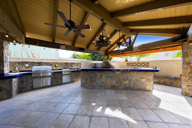 Building Photo - Beautifully maintained Tuscan-style custom home