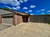 Building Photo - 3 bedroom home w/ privately fenced yard + hot tub.