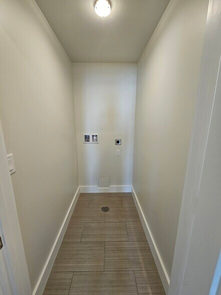 Laundry Room, Doesnt Show Stack Lg Capacity Washer Dryer" - 383 Commercial St
