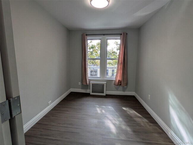 Building Photo - 205-17 Hollis Ave