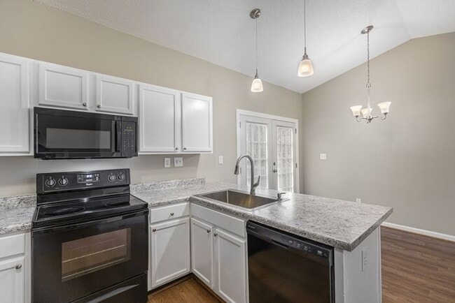 Building Photo - Like New Home off Freeman Mill. Just Painted, New Wood/Vinyl Flooring, Vaulted Ceilings, Front Po...