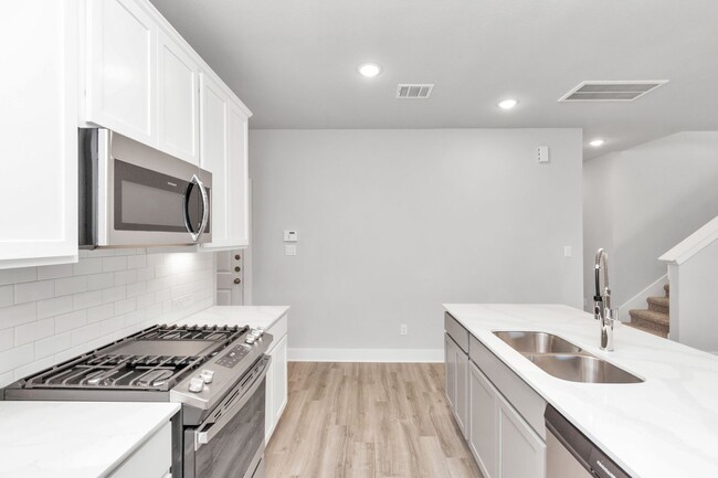 Building Photo - Welcome to the Redbud — A Fresh Take on Modern Living.
